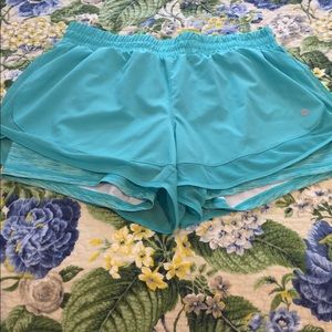 Teal Avis running shorts